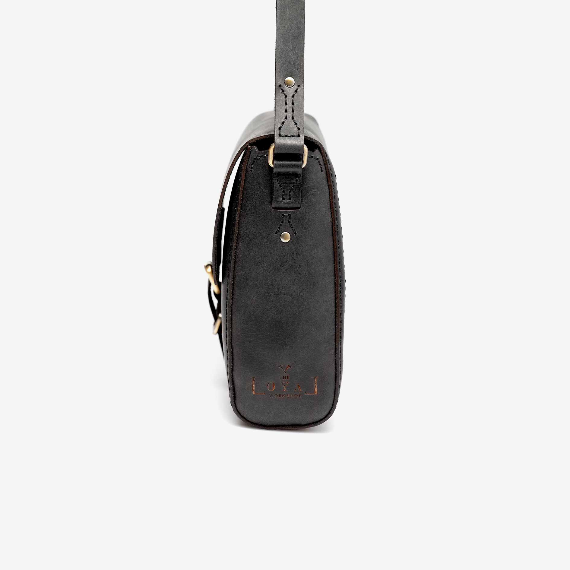 https://cdn.shopify.com/s/files/1/0746/9767/0945/products/the-loyal-workshop-the-companion-satchel-black-03.jpg?v=1717578811